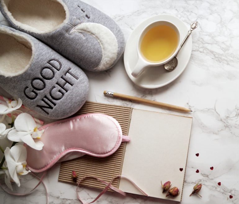 Slippers, sleep mask and a cup of tea| Featured Image for What is Sleep Hygiene blog on Wenatex.