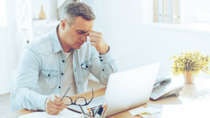 stressed man | Featured Image for is there such a thing as too much sleep blog on Wenatex.