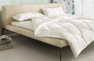 Photo of a bed, mattress and pillows | Featured image for Product Guarantee.
